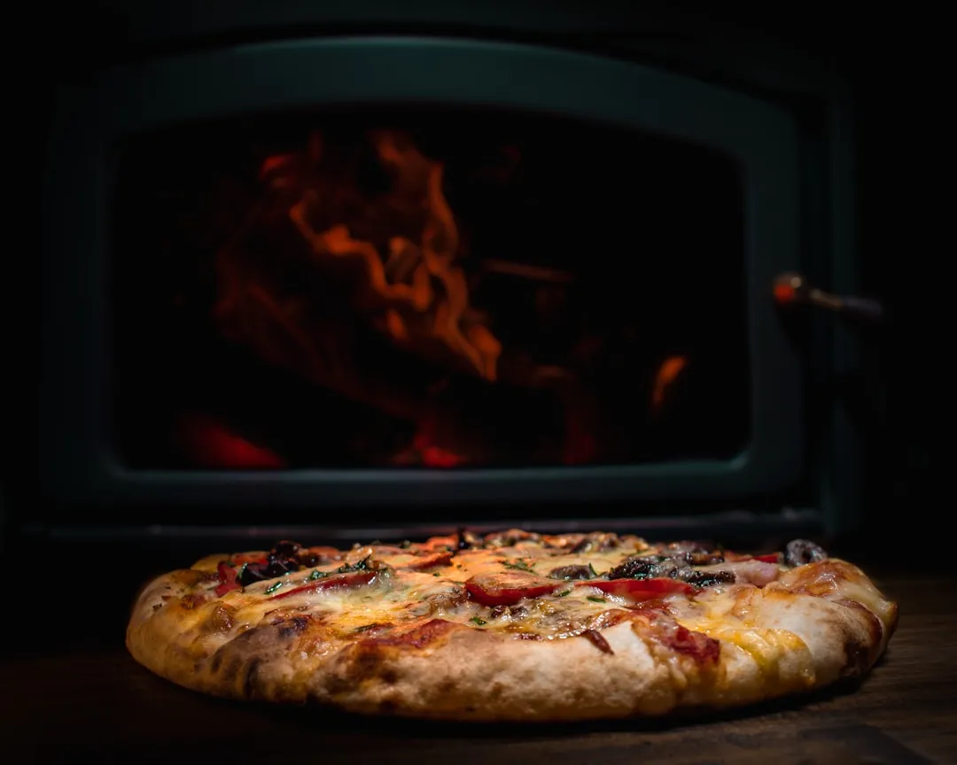 pizza on white ceramic plate