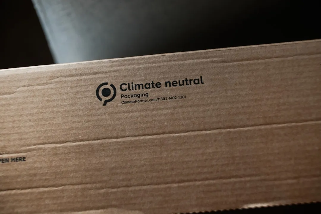a cardboard box with a climate neutral logo on it
