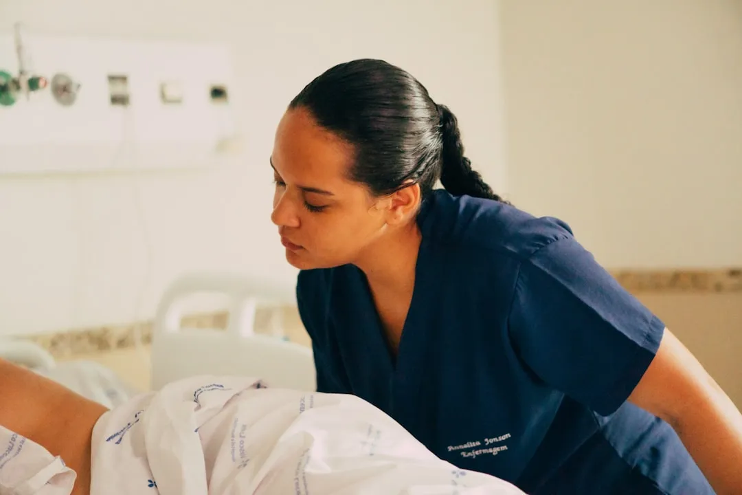 A nurse is attending to a patient in a hospital.