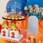 It is a vibrant car-themed birthday party display.