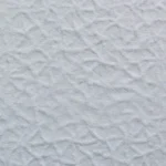 a close up of a white textured wall