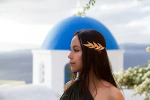 a woman with a gold hair pin in her hair