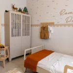 A cozy child's bedroom with a single bed.
