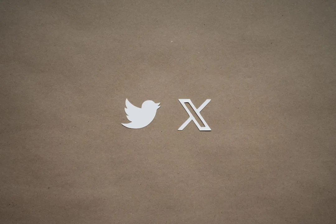 a close up of a piece of paper with a twitter logo on it