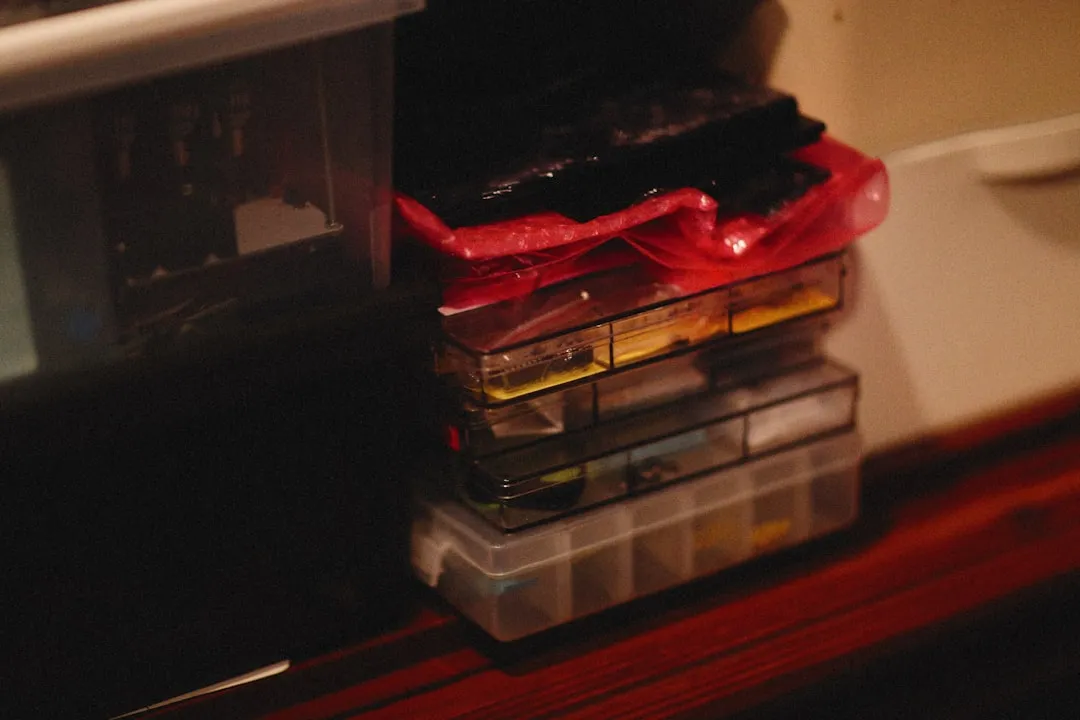 a stack of plastic containers sitting on top of a counter
