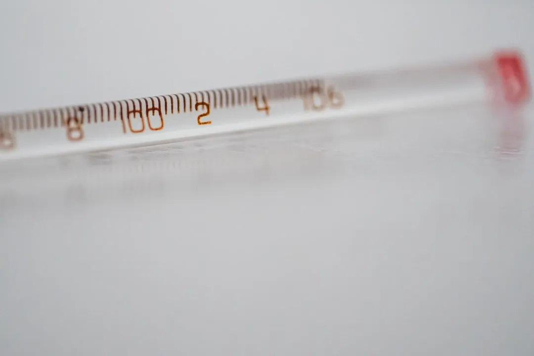 white thermometer at 37 0
