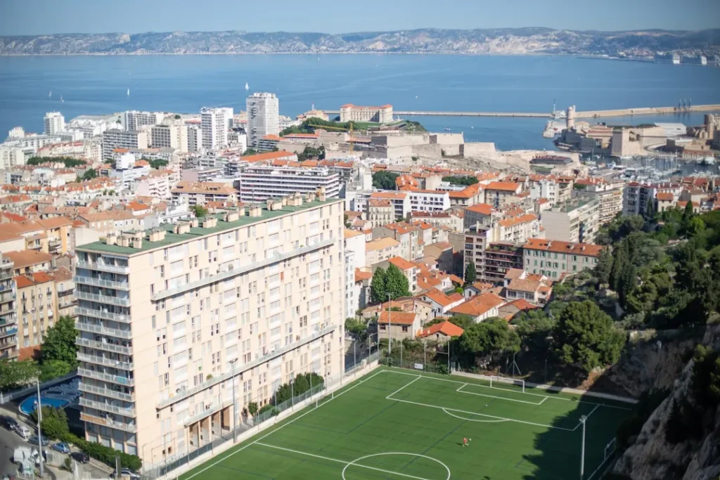 a soccer field in the middle of a city