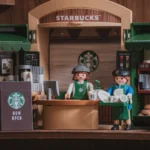 Playmobil figures working at a starbucks counter