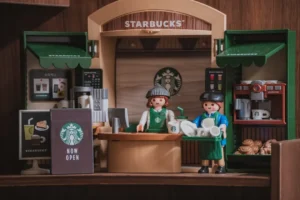 Playmobil figures working at a starbucks counter