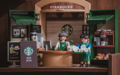 Playmobil figures working at a starbucks counter