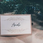 Amali sign on taupe textile