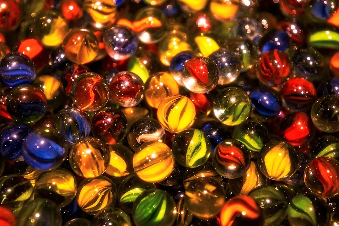 A close up of a bunch of glass marbles