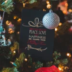 selective focus photography of hanged ornaments on Christmas tree