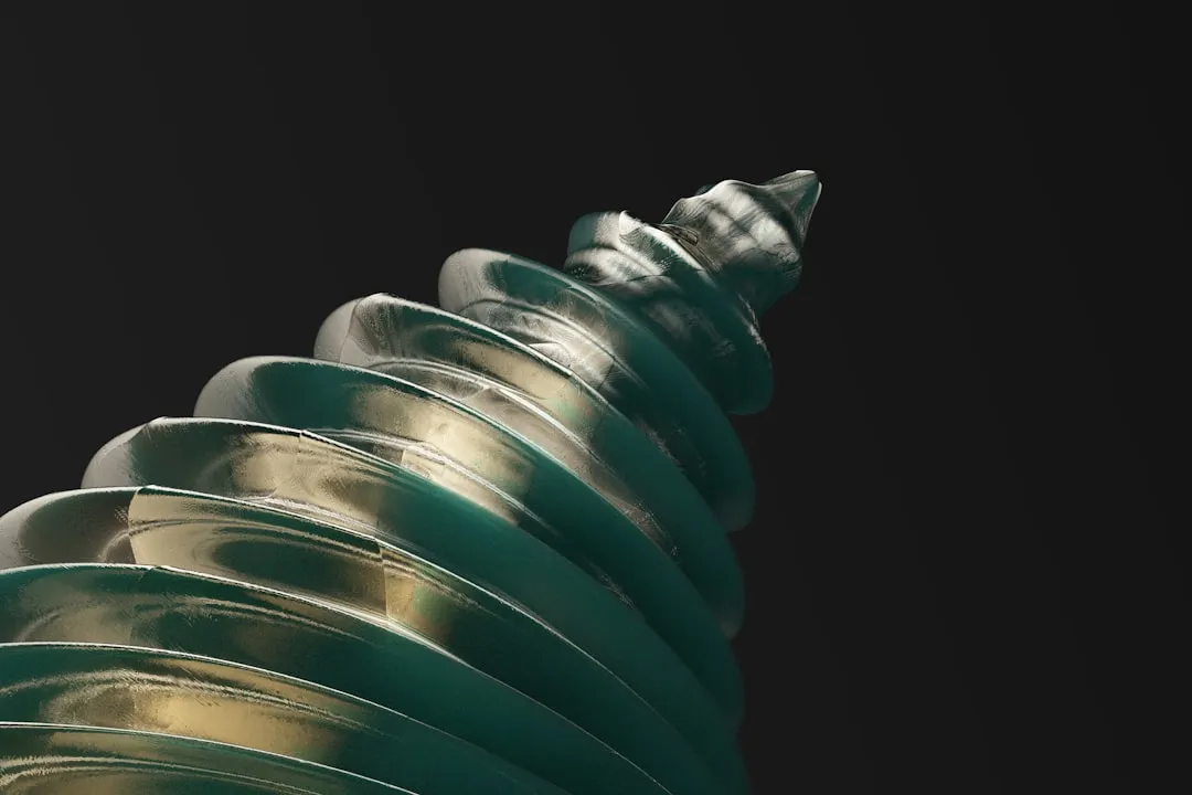 a close up of a green object on a black background