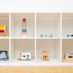 a shelf filled with lots of different types of toys