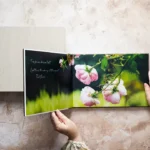 a pair of feet holding a book