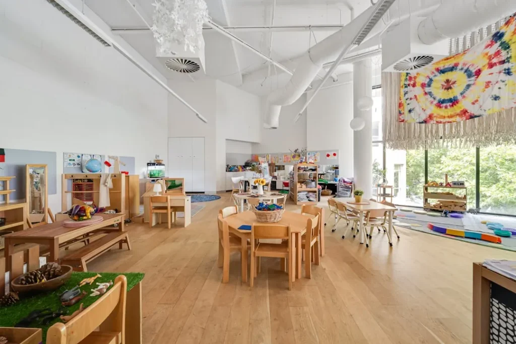 A room filled with lots of wooden tables and chairs